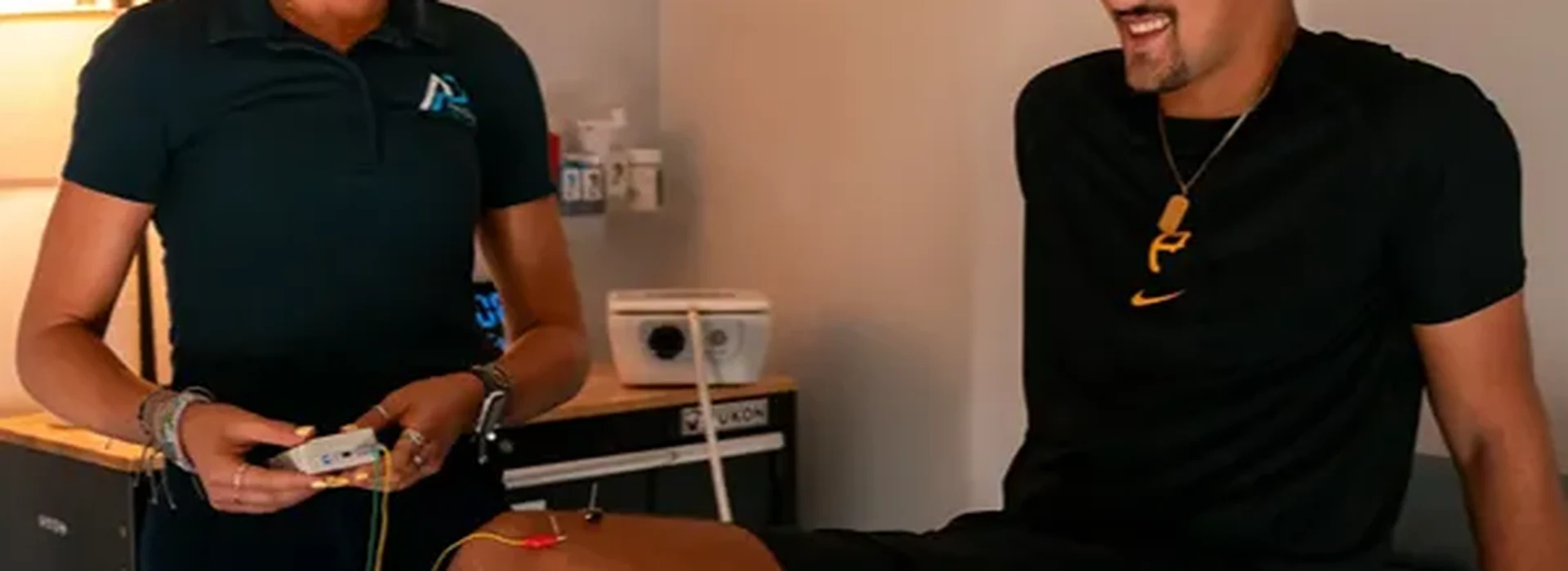 Hands-on treatment session with an athlete at Athlete Pro Sports Medicine in Sarasota, FL